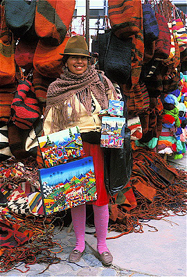 Tigua Woman selling artwork  at Otavalo Market