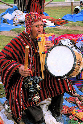 Quechua Man Playing Drum and Zampona 