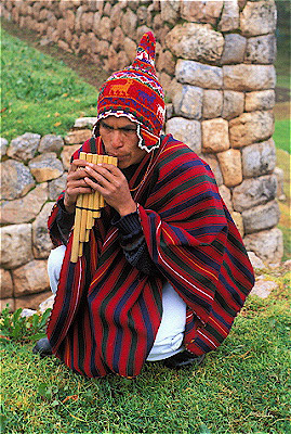 Quechua Man Playing Zampona (Andean Pipes)