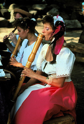 Woman Playing Recorders